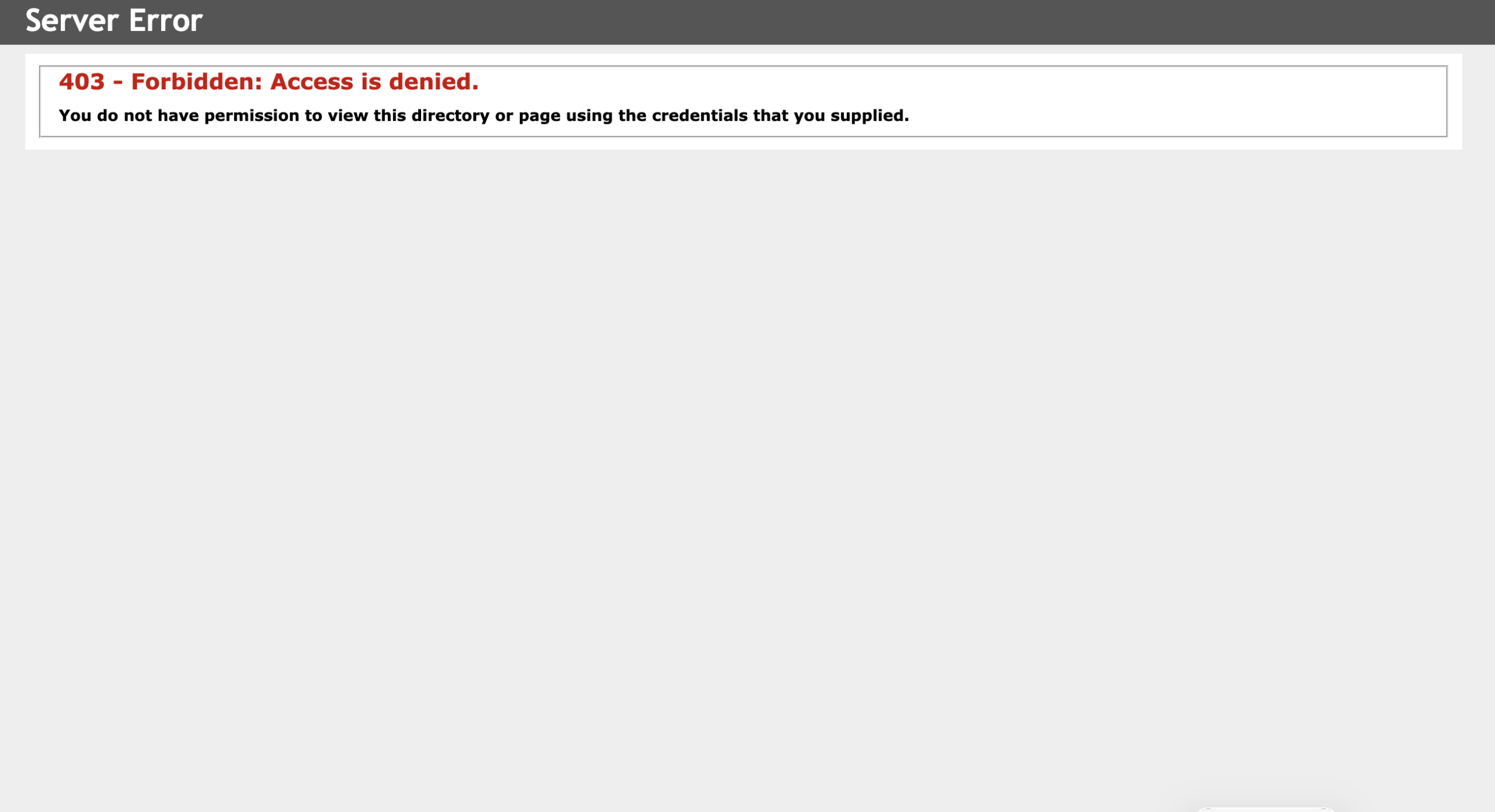 A frustrated trader looking at a laptop screen displaying trading charts, reflecting concerns about using AllianceCryptoFXTrade.com.